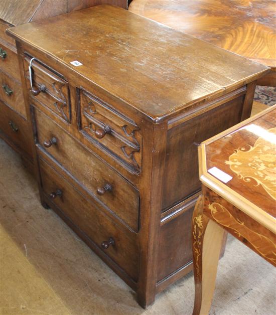 Small carved oak chest of drawers